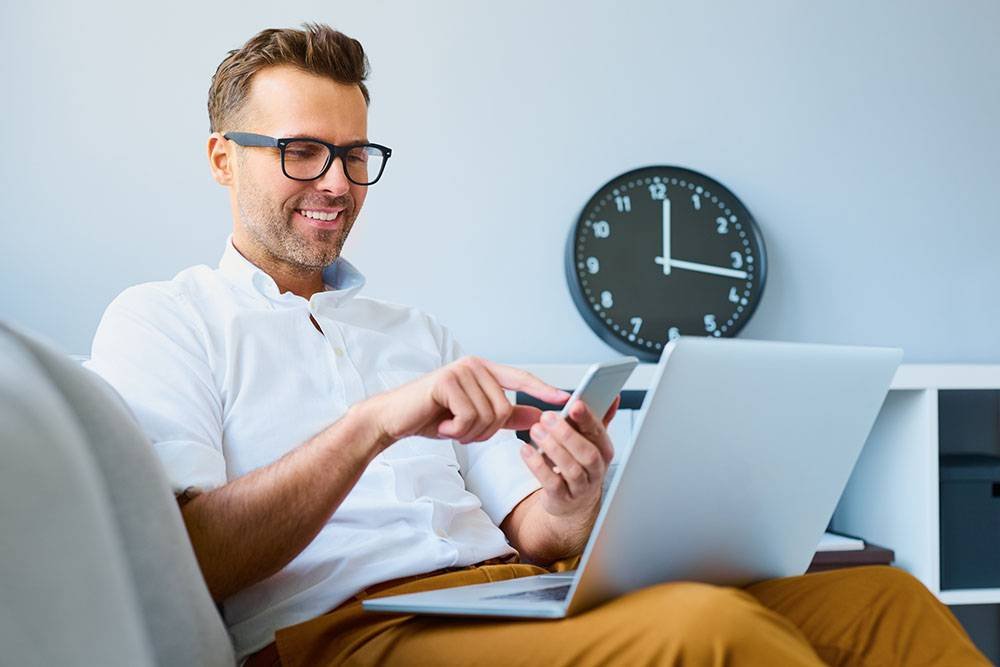 Man Using His Smartphone for Online Banking