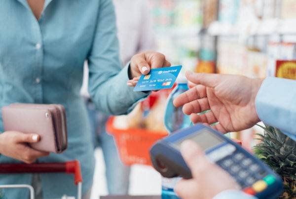 Lady Using Credit Card for Payment