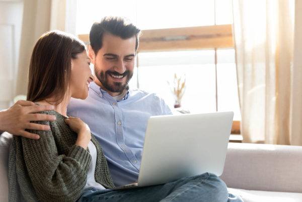 Man and Woman with Laptop