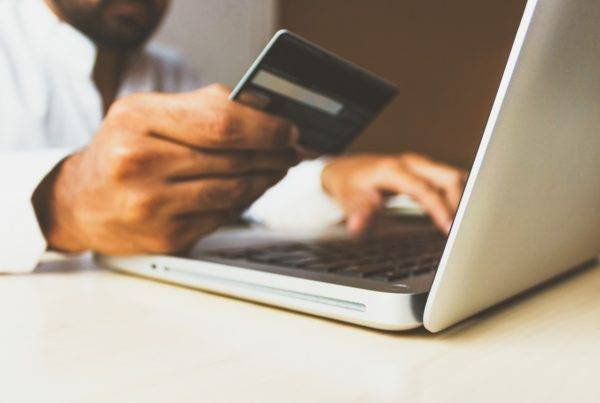 Man Holding a Bank Card