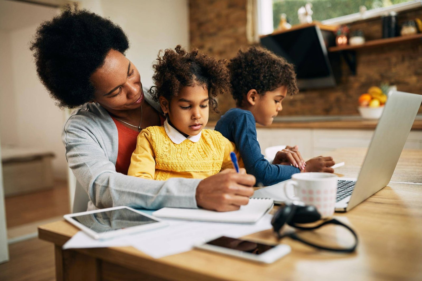 Mother teaching her children about money