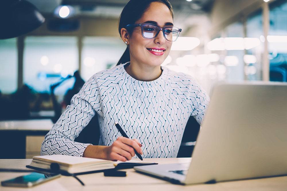 Woman Working on Laptop