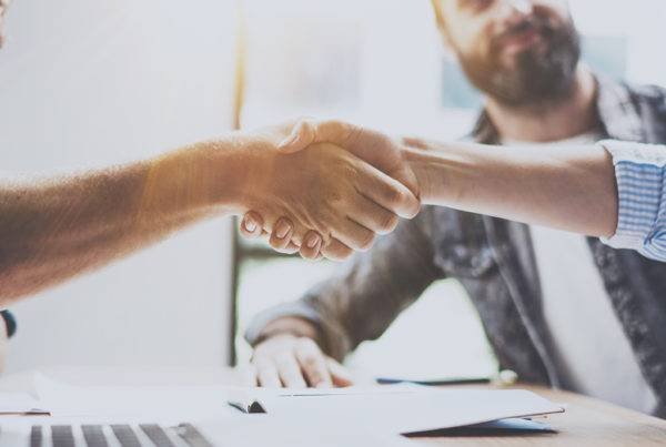 Persons Shaking Hand