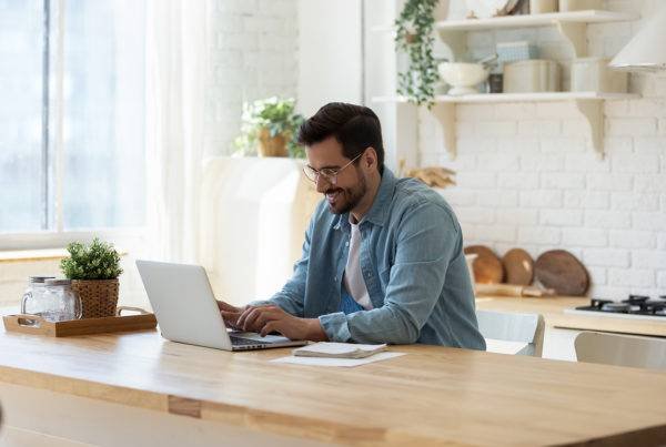 A Guy Working on Laptop