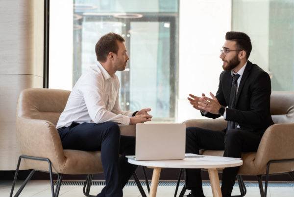 Two Men Talking Together