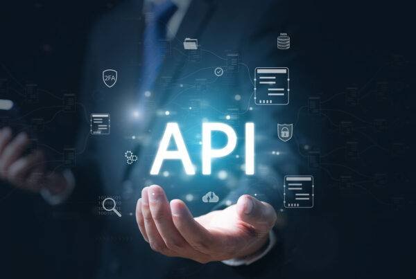 A man with the word API in his hand.