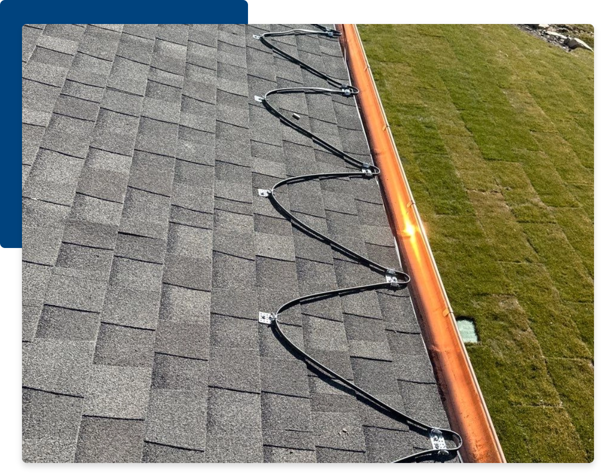 Cutting-Edge Technology That Keeps You Prepared, part of a roof with an ice-melting system on it