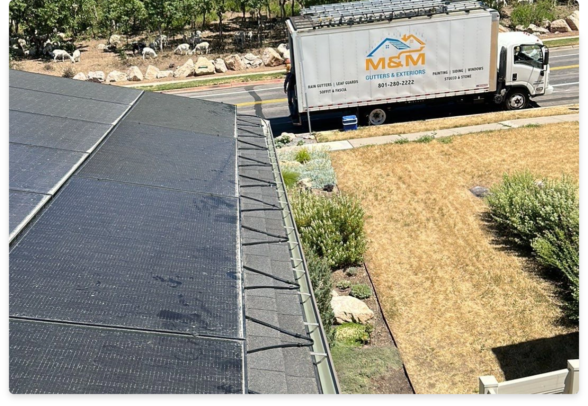 Utah's Preferred Ice-Melt Systems, part of a structure with heat cables on the roof