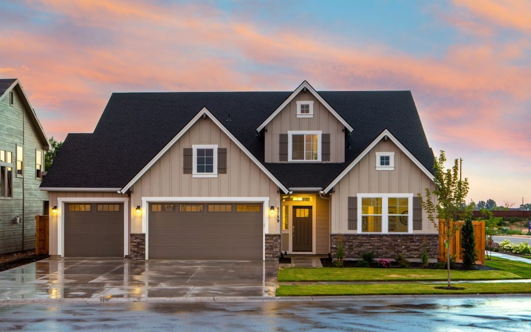 front exterior of a home at sunset with a new roof