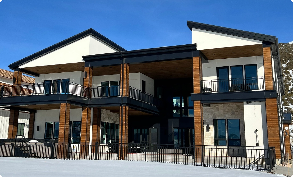 Image of part of a structure with a golden-yellow rectangle with rounded corners partially behind the image