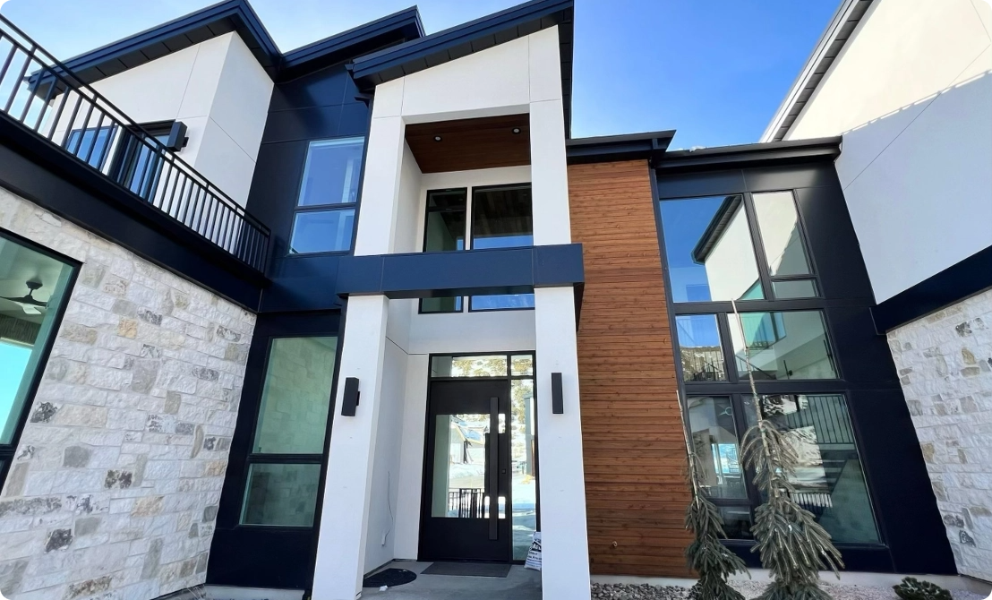 Part of a structure with a blue rectangle with rounded corners partially behind the image of part of the structure